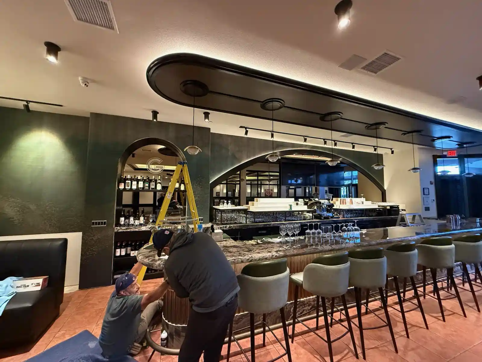 Our wallpaper installation team at work on a Providence project