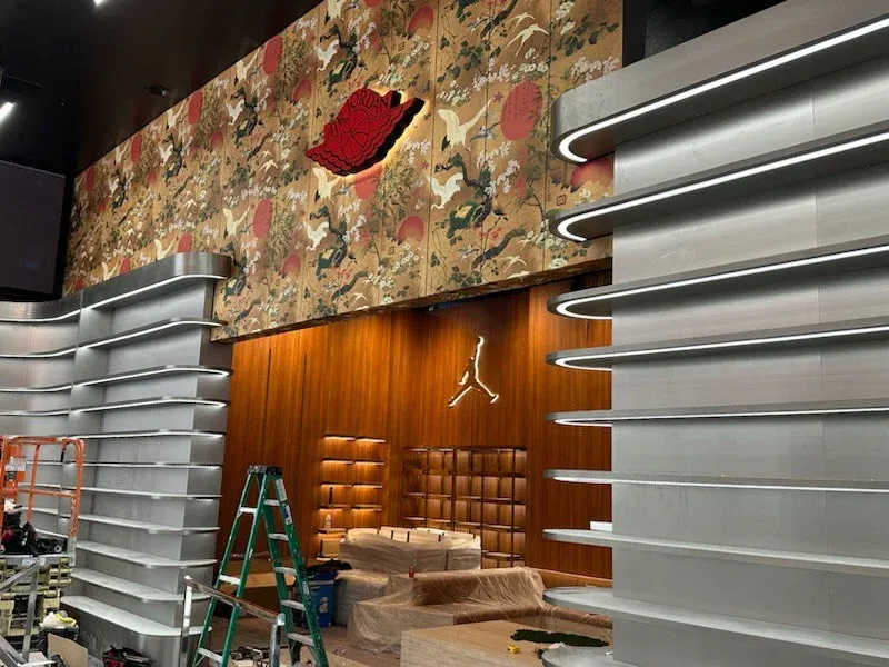 Designer wallpaper installed in a Newport vacation property bathroom