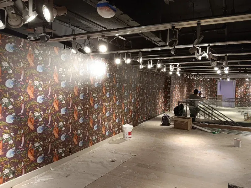 Completed commercial wall covering in a modern office space
