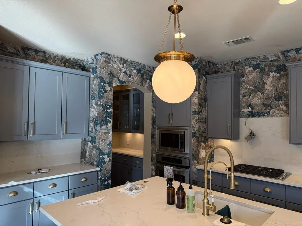Completed residential wallpaper project in an elegant room